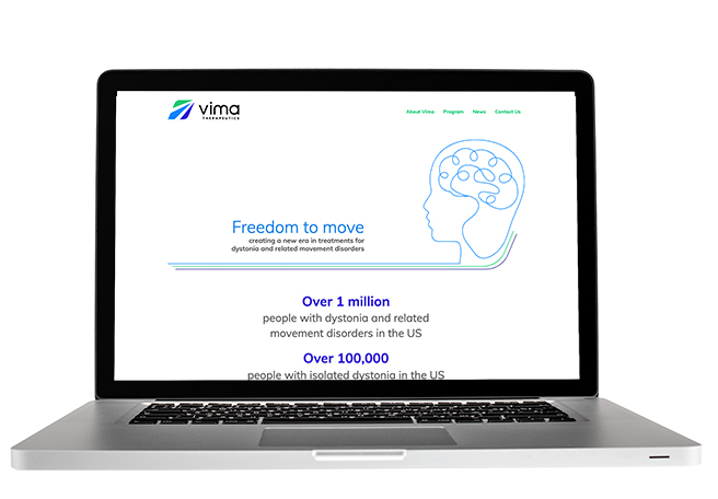 Laptop showing image of Vima's website design